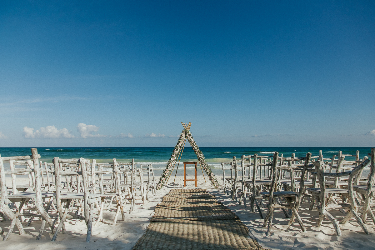 Boho teepee decor at Akiin Beach Tulum Wedding in Mexico by Caro Navarro Photography