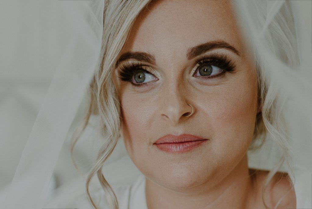 Natural bridal makeup look with lashes at Moon Palace Cancun, Mexico. Caro Navarro Wedding Photography