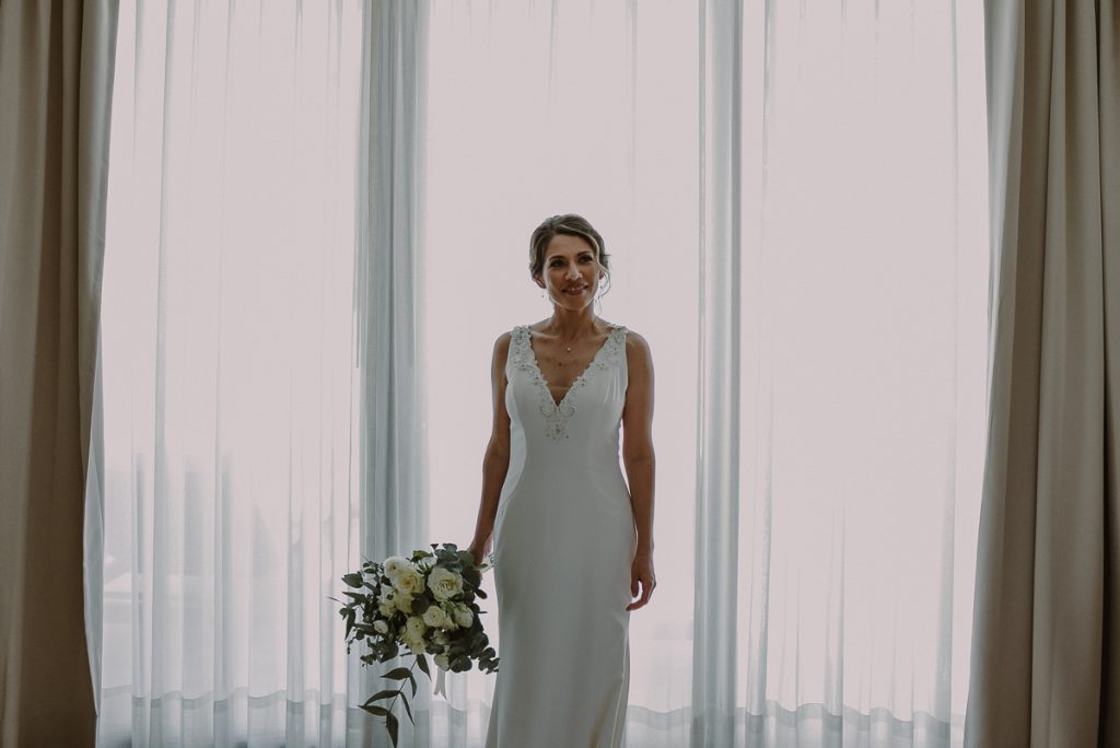 V neck wedding dress at Heritage Fairmont Mayakoba, Mexico. Caro Navarro Photography