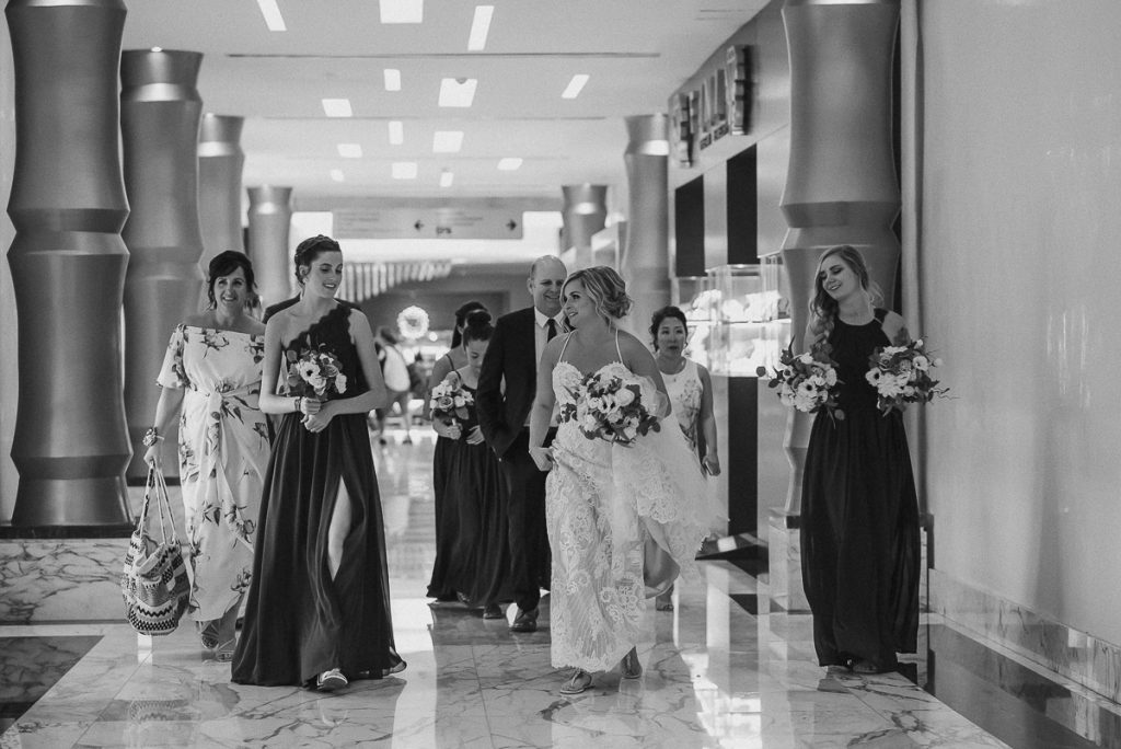 Bride and bridesmaids at Moon Palace Cancun lobby. Caro Navarro Photography