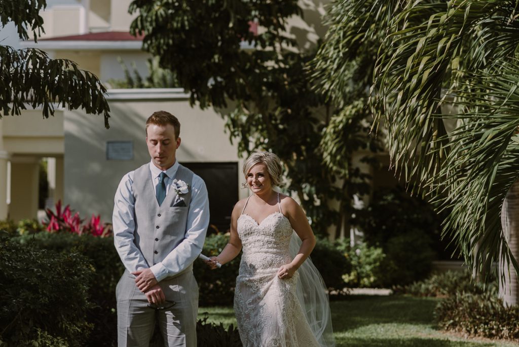 Bride and groom first look by Caro Navarro Moon Palace Wedding Photography