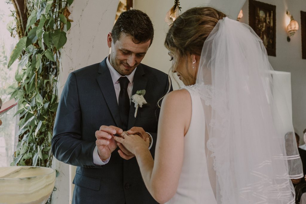 Ring exchange at Church Wedding in Playa del Carmen, Mexico. Caro Navarro Photography