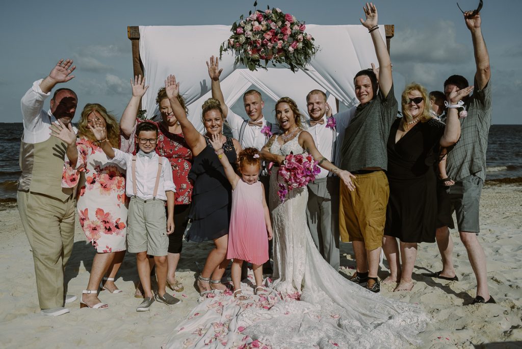 Wedding group shot at Now Sapphire Riviera Cancun, Mexico. Caro Navarro Photography