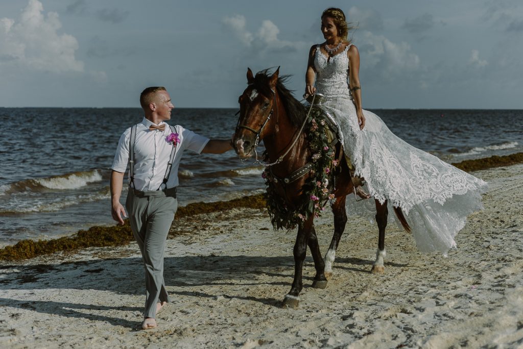 Horse wedding at Now Sapphire Riviera Cancun, Mexico. Caro Navarro Photography