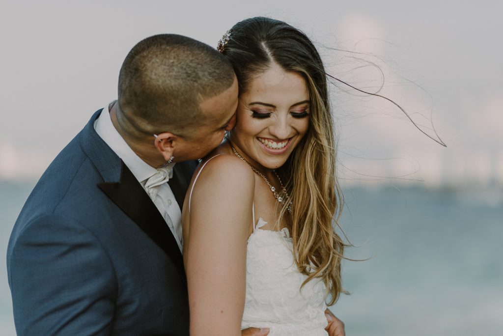Bride and groom closeup portraits. Riu Caribe Cancun wedding by Caro Navarro Photography