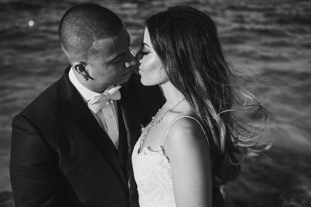 Bride and groom beach portraits. Riu Caribe Cancun destination wedding by Caro Navarro Photography