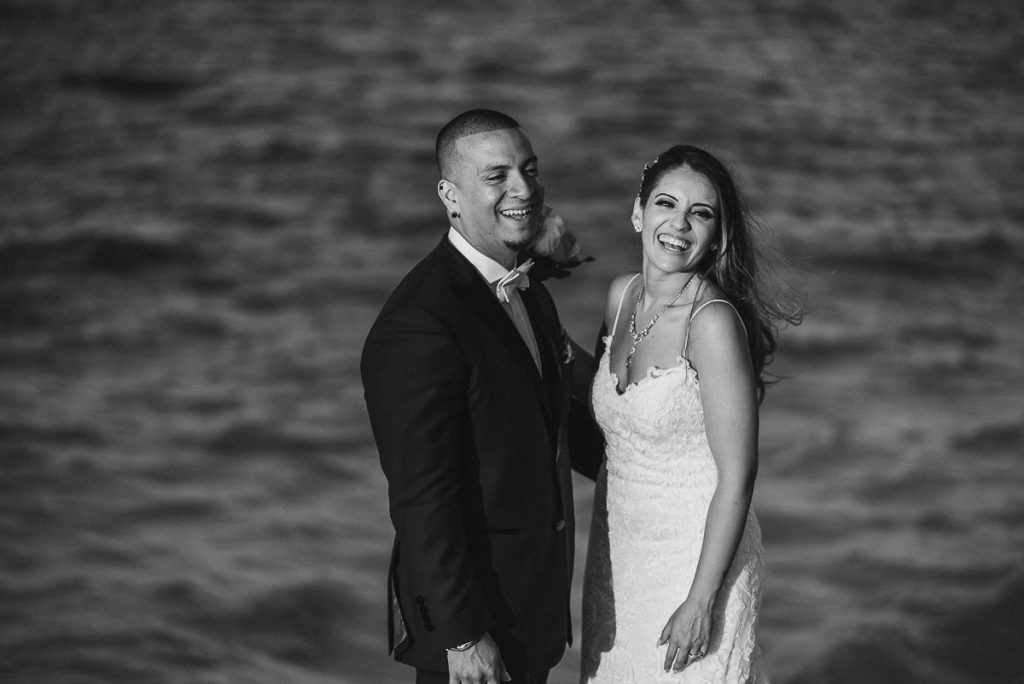 Bride and groom beach portraits. Riu Cancun destination wedding by Caro Navarro Photography