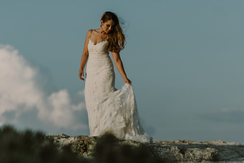 Beach bride portraits. Riu Caribe Cancun destination wedding by Caro Navarro Photography