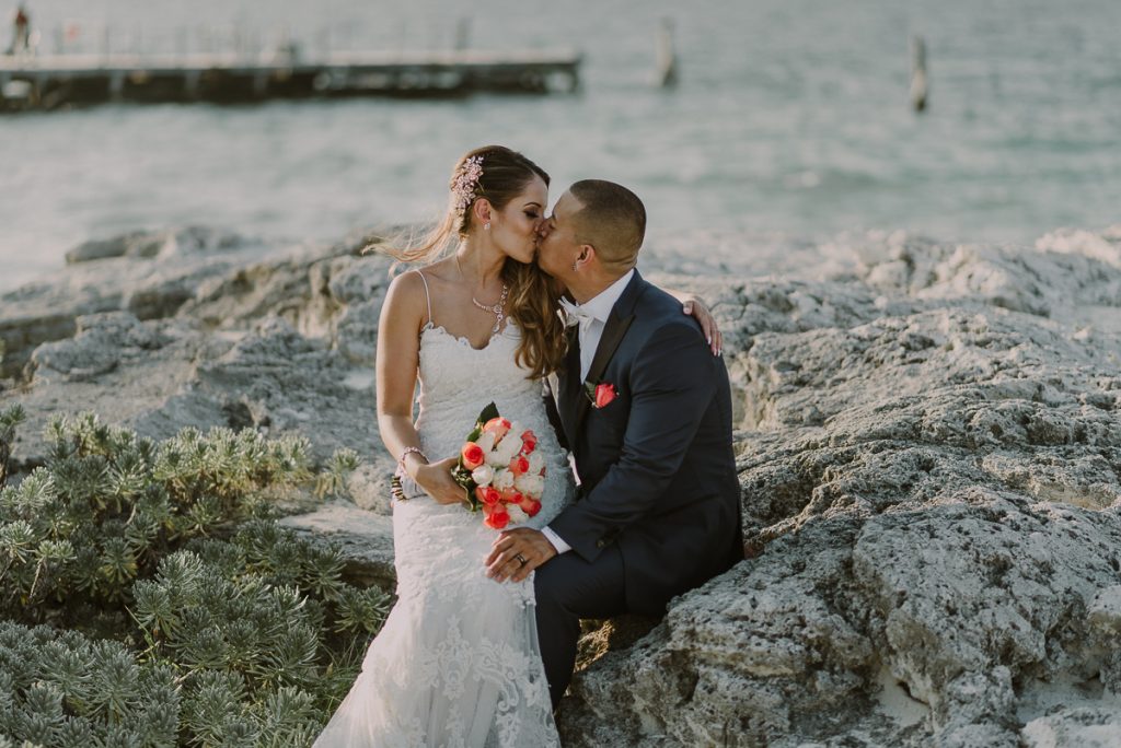 Bride and groom beach portraits. Riu Caribe Cancun destination wedding by Caro Navarro Photography
