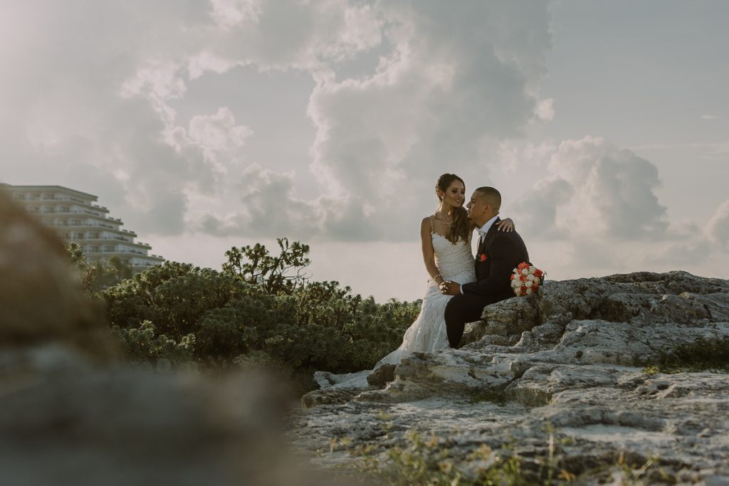 Bride and groom beach portraits. Riu Caribe Cancun destination wedding by Caro Navarro Photography