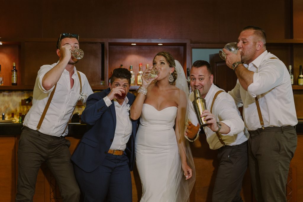 Bridal party bar portraits at Grand Palladium Riviera Maya LGBT Wedding in Mexico. Caro Navarro Photography