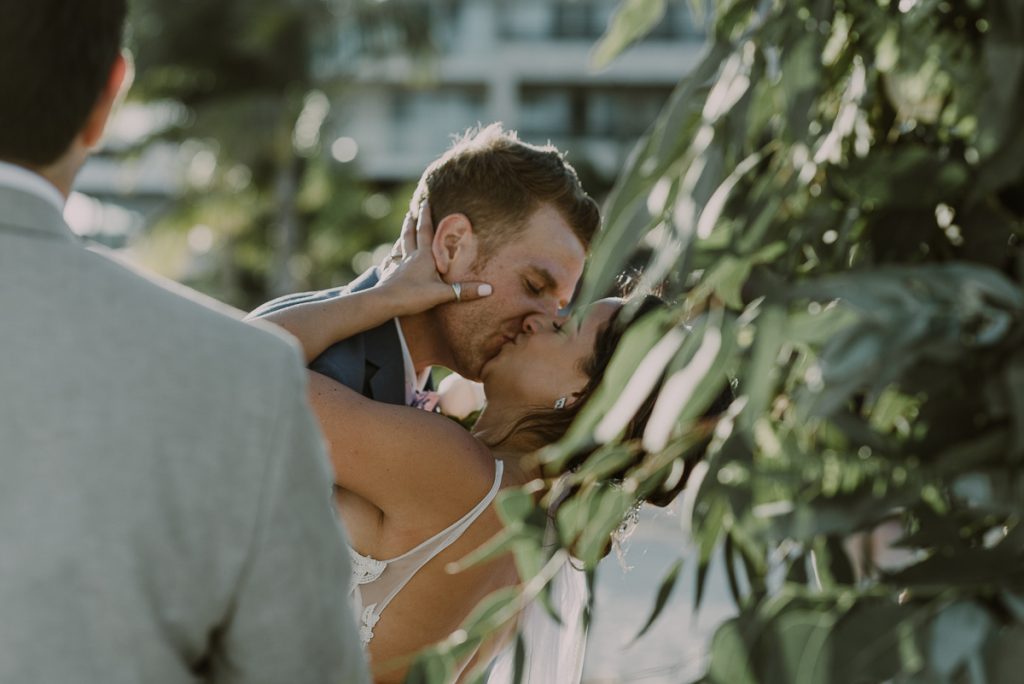 You may kiss the bride. Royalton Riviera Cancun beach wedding by Caro Navarro Photography
