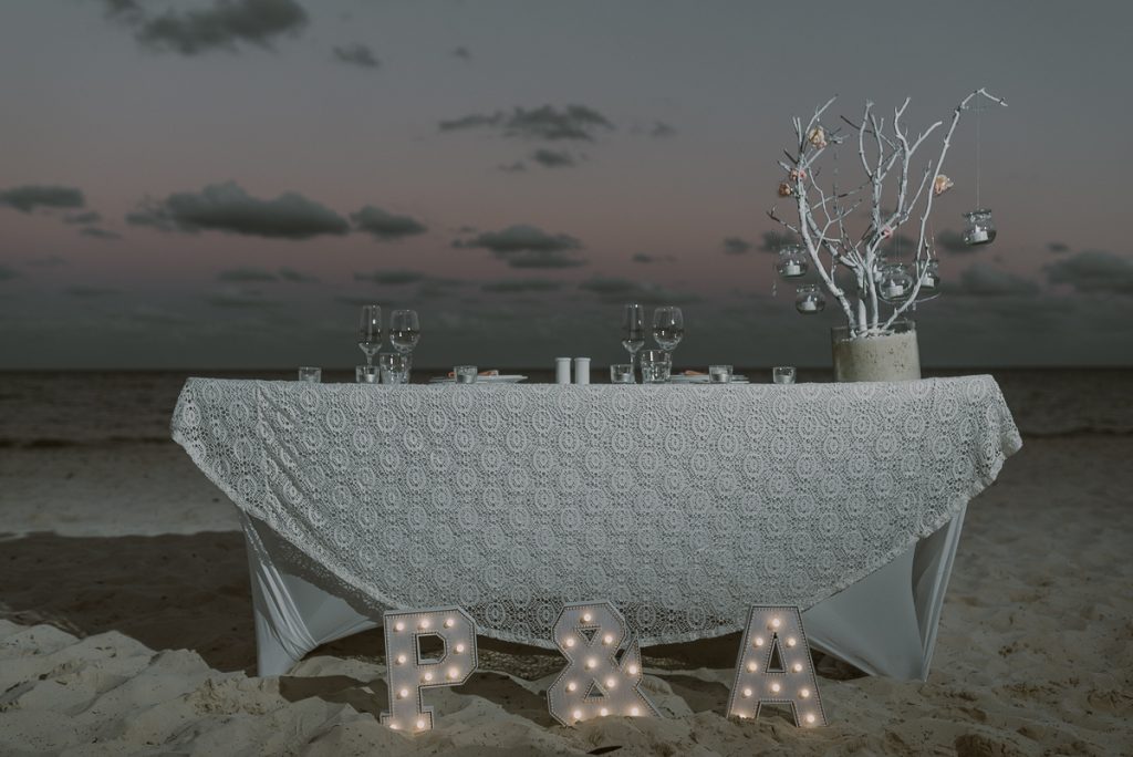 Sweetheart table with lighted letters. Royalton Riviera Cancun Wedding by Caro Navarro Photography