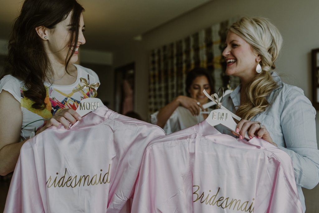 Pink bridesmaids robes at a Royalton Riviera Cancun Wedding. Caro Navarro Photography 
