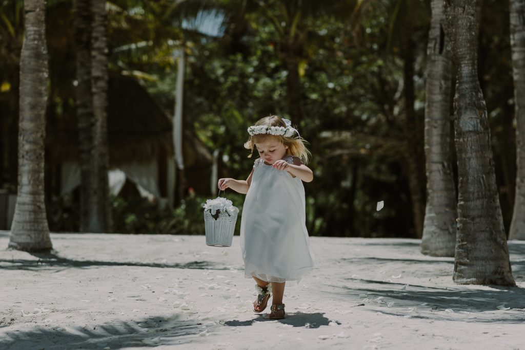 Flower girl at  Grand Palladium Riviera Maya LGBT Wedding in Mexico. Caro Navarro Photography