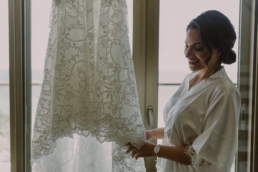 Bride and lace wedding dress at Royalton Riviera Cancun. Caro Navarro Photography