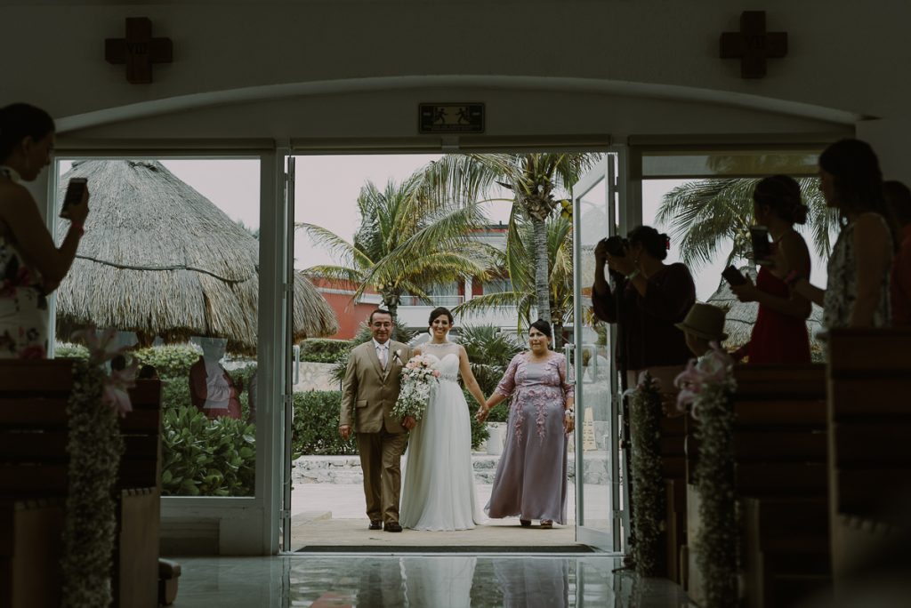 Here comes the bride. Glam Hard Rock Riviera Maya Church Wedding by Caro Navarro Photography