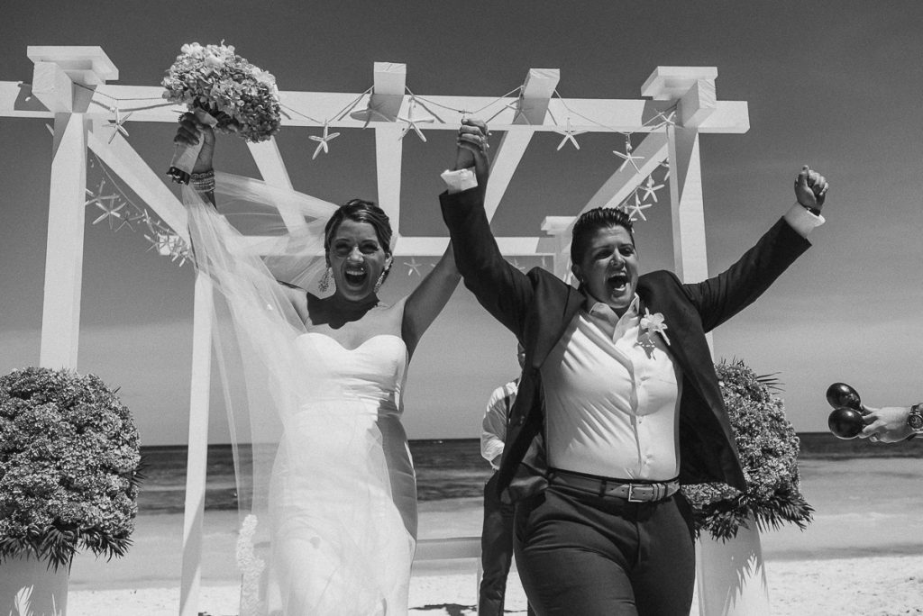 Bride and bride exit. Grand Palladium Riviera Maya Beach Wedding in Mexico. Caro Navarro Photography