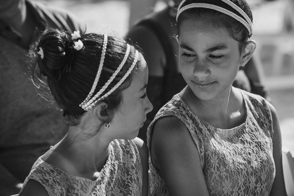 Flower giels at Riu Caribe Cancun beach destination wedding by Caro Navarro Photography
