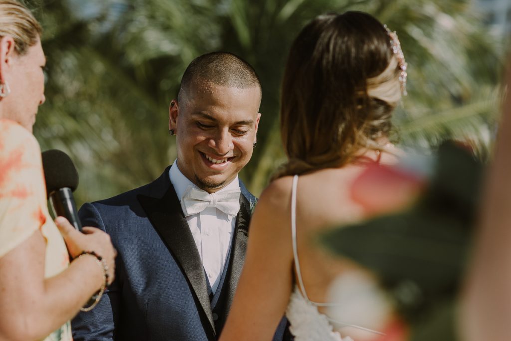Groom at Riu Caribe Cancun beach wedding by Caro Navarro Photography