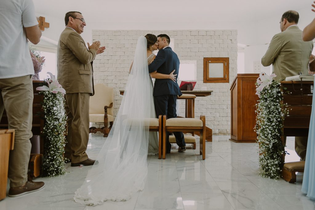 You may kiss the bride. Glam Hard Rock Riviera Maya Destination Wedding, Mexico. Caro Navarro Photography