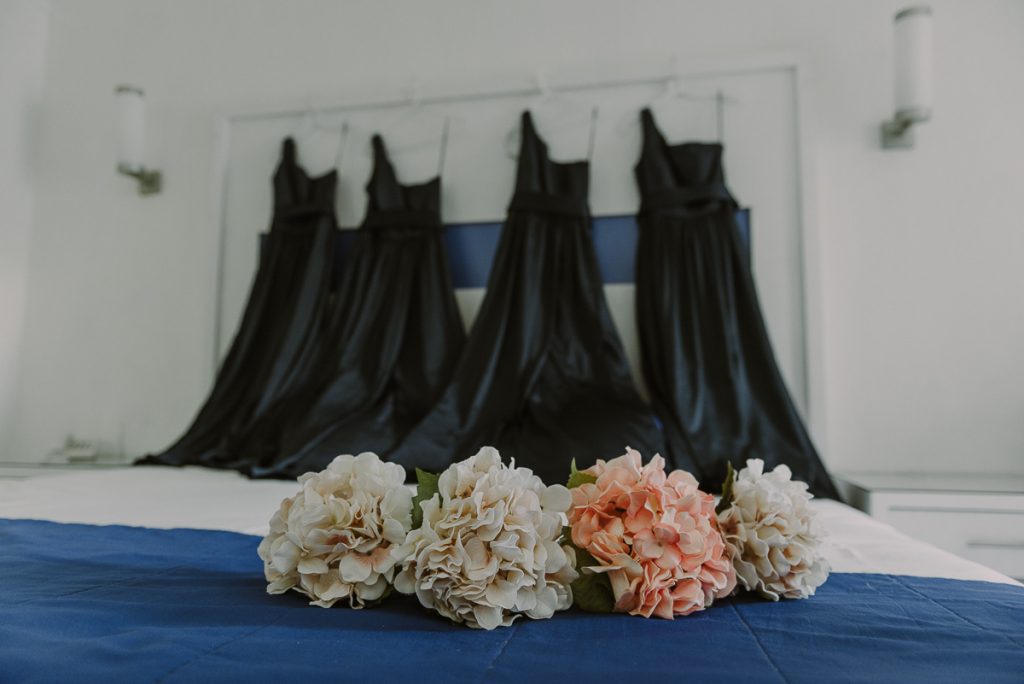 Navy blue bridesmaids dresses and silk bouquets at Riu Caribe Wedding. Caro Navarro Photography