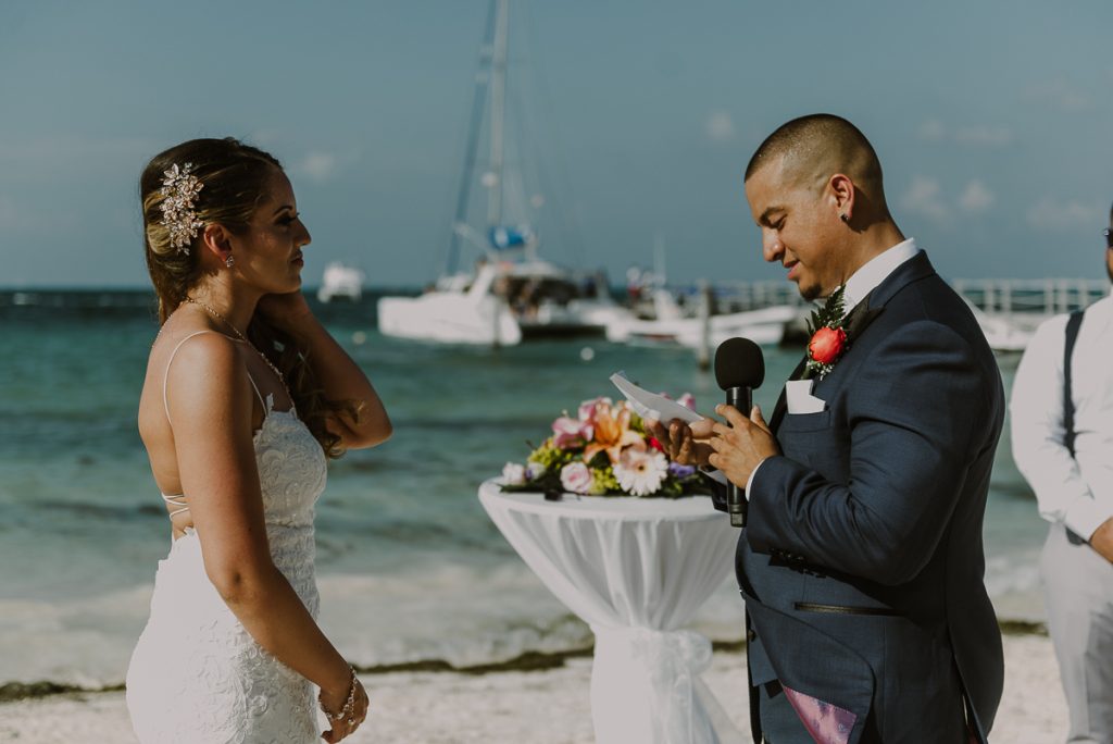 Vows moments during Riu Caribe Cancun beach destination wedding by Caro Navarro Photography