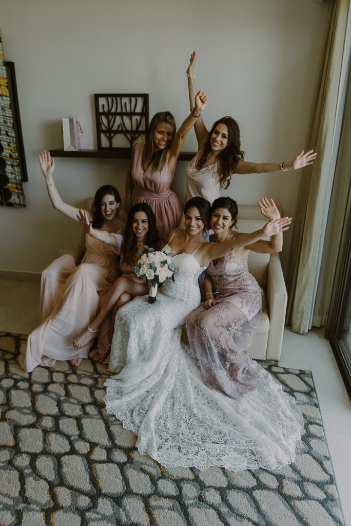 Bride and bridesmaids at Royalton Riviera Cancun Wedding. Caro Navarro Photography