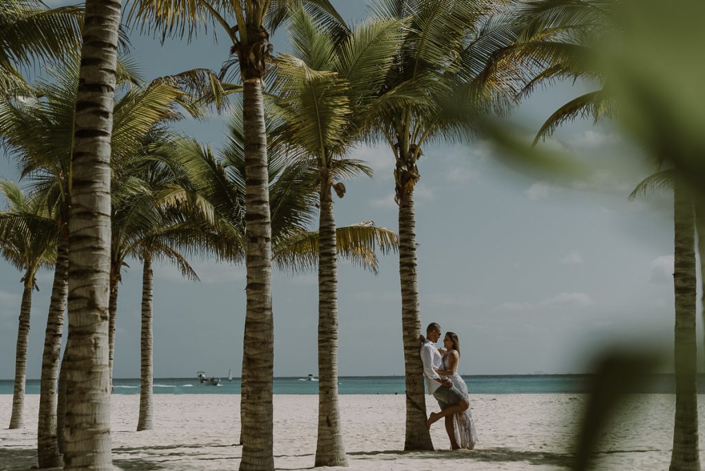 Bride and groom beach portraits at Royal Hideaway Playacar in Mexico by Caro Navarro Wedding Photography