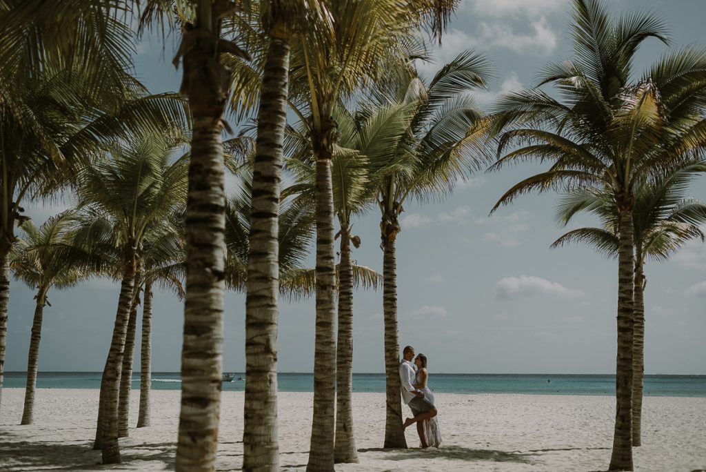 Bride and groom beach portraits at Royal Hideaway Playacar in Mexico by Caro Navarro Wedding Photography