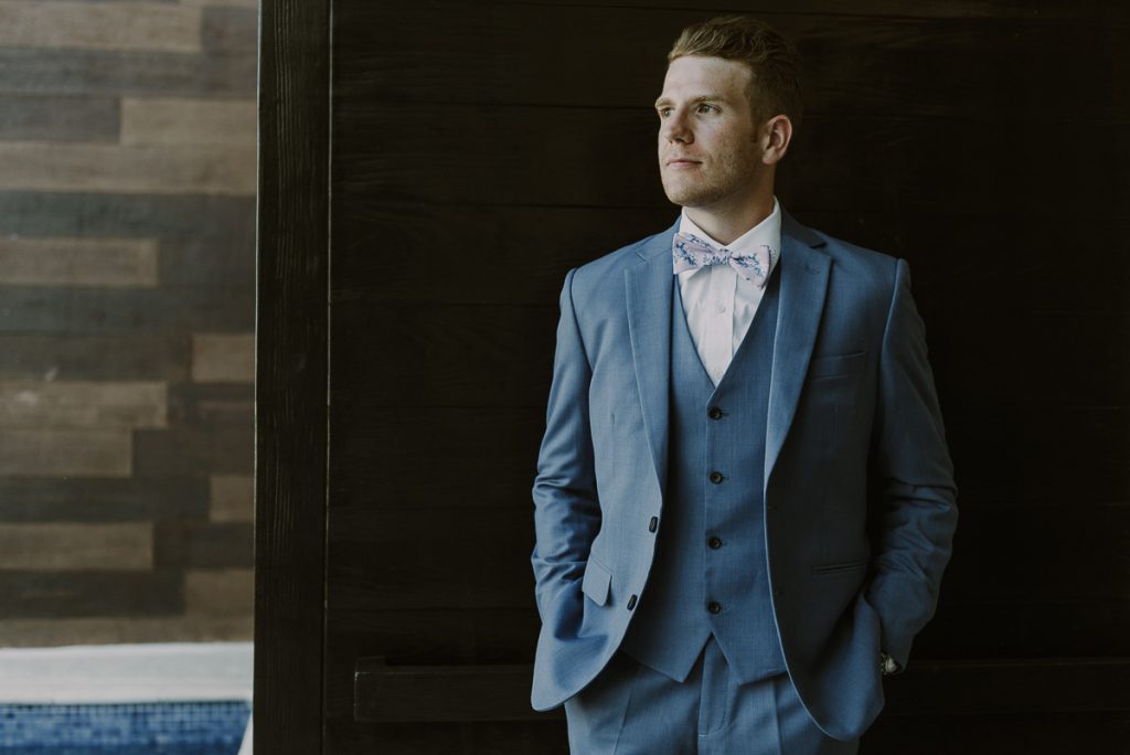Groom portraits in natural light at Royalton Riviera Cancun. Caro Navarro Wedding Photography