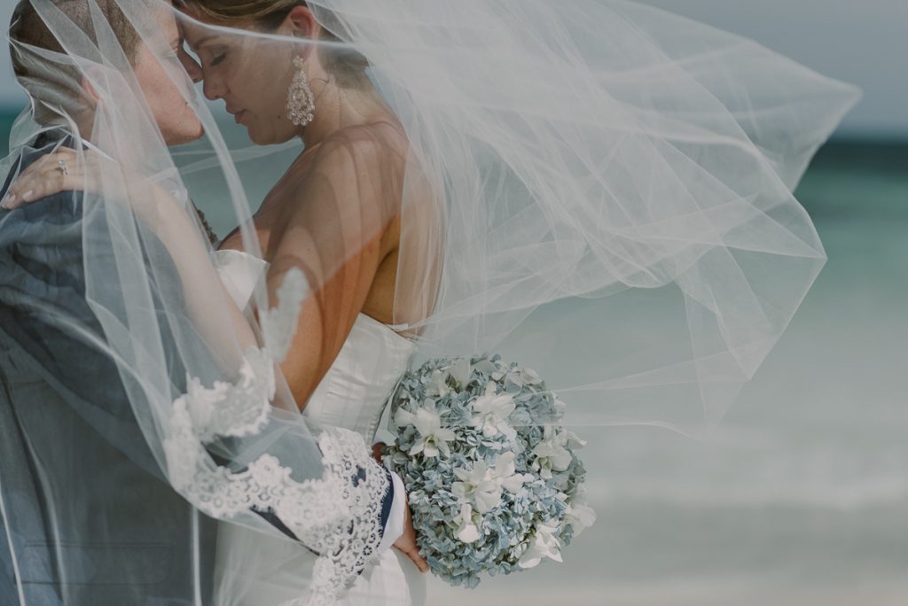 Bride and bride portraits with veil at Grand Palladium Riviera Maya LGBT Wedding in Mexico. Caro Navarro Photography