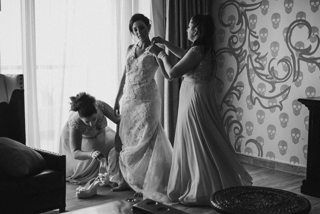 Black and white getting ready photo of bride at Glam Hard Rock Riviera Maya Destination Wedding. Caro Navarro Photography