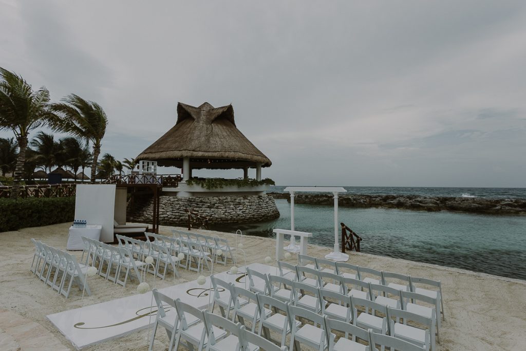 White beach wedding decor at Hard Rock Riviera Maya, Mexico. Caro Navarro Photography