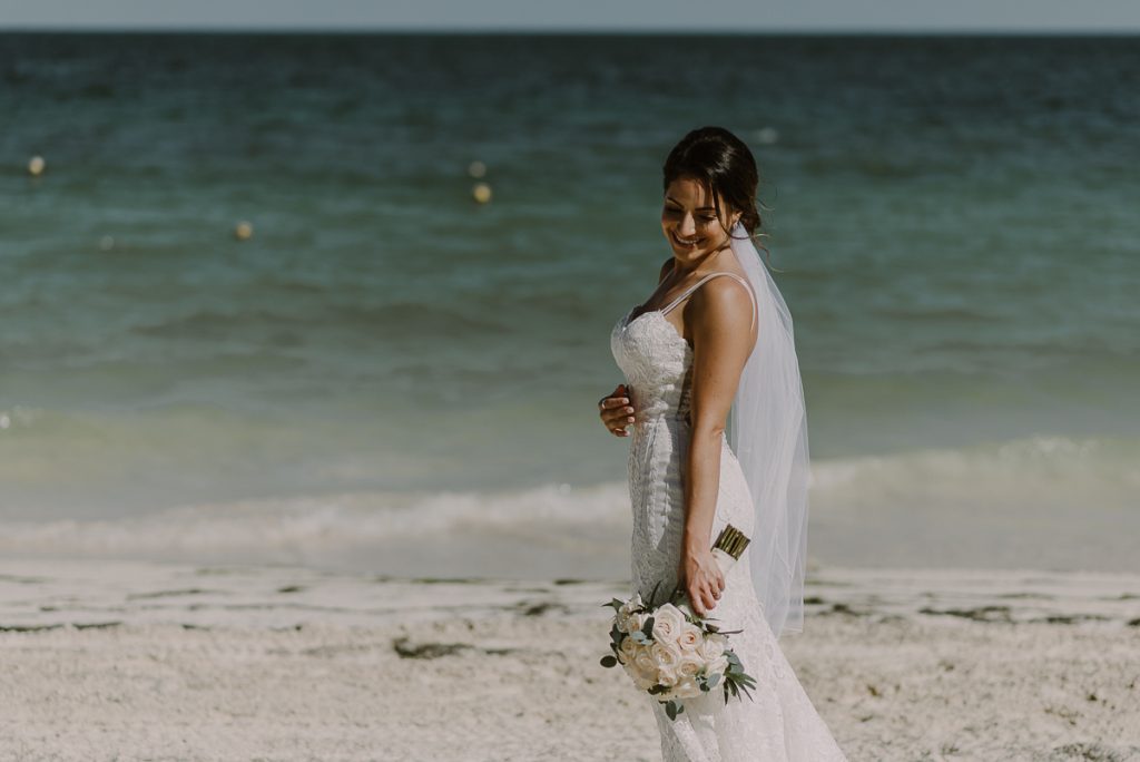 Destination beach bride at Royalton Riviera Cancun. Caro Navarro Wedding Photography