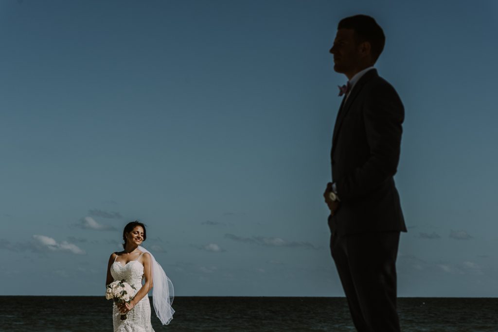 Creative bride and groom portraits by Caro Navarro Photography at Royalton Riviera Cancun