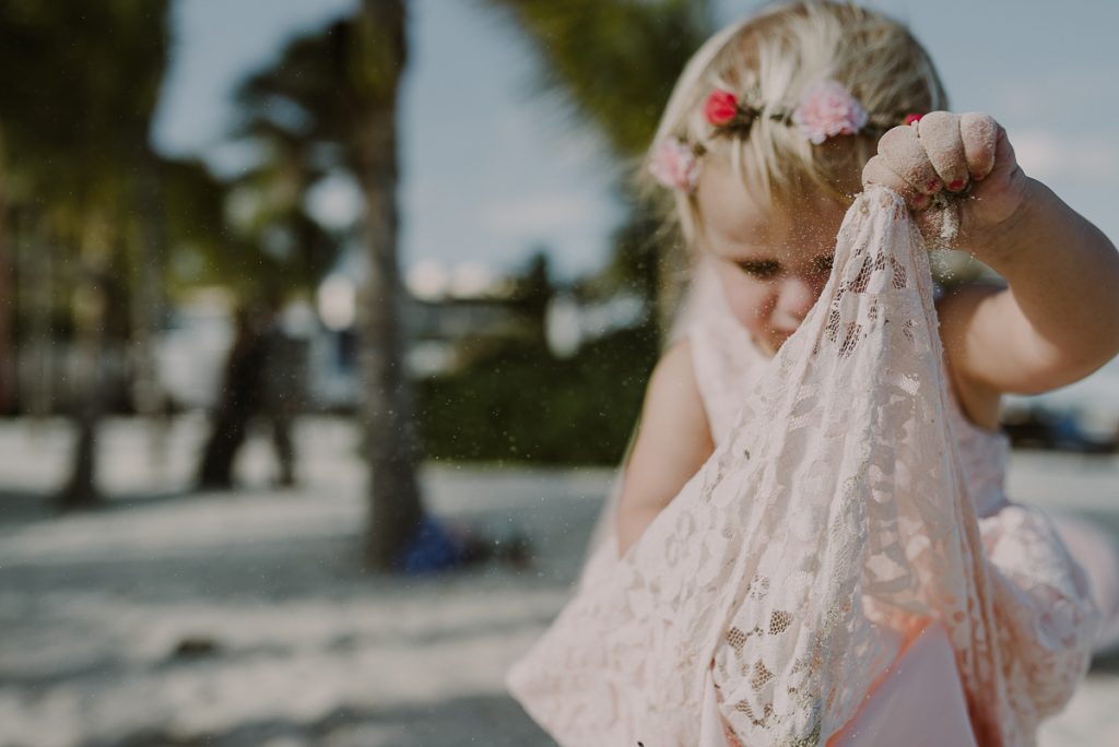 Flower girl in pink lace dress. Royalton Riviera Cancun Wedding by Caro Navarro Photography