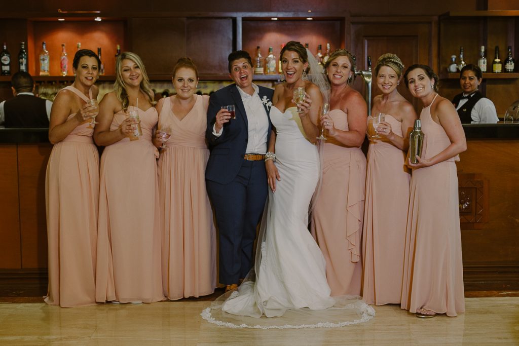Bridal party bar portraits at Grand Palladium Riviera Maya LGBT Wedding in Mexico. Caro Navarro Photography