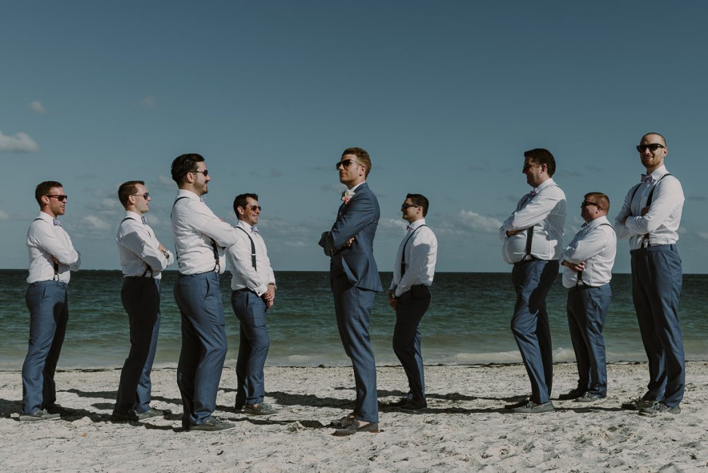 Groom and groomsmen beach portraits at Royalton Riviera Cancun, Mexico. Caro Navarro Wedding Photography