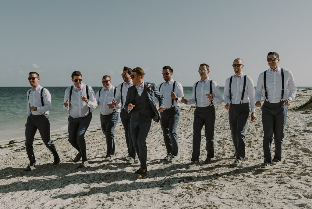 Groom and groomsmen beach portraits at Royalton Riviera Cancun, Mexico. Caro Navarro Photography